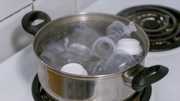 sterilize bottle with boiling water